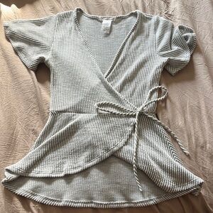 Caution to the wind flattering top